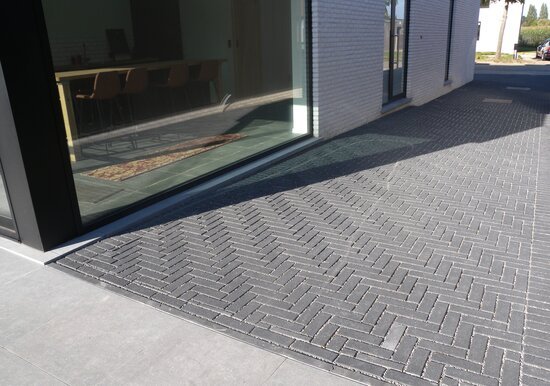 Bowler - turf Waterpasserende bestrating